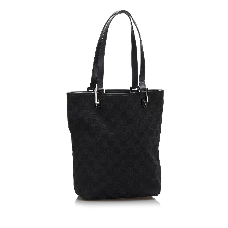 Women Gucci Sylvie bags with a crystal - embellished web stripeGucci GG Canvas Tote (SHG-BFbEcv)