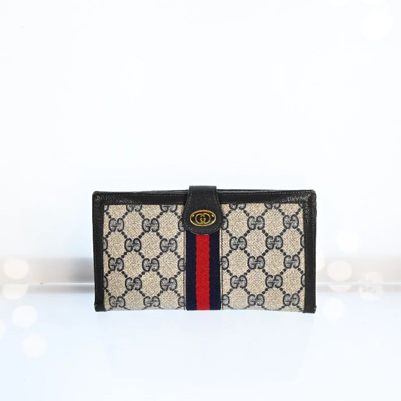 Gucci Marmont bags for women with quilted leather exteriorsGucci Gg Pvc Leather Long Wallet Navy