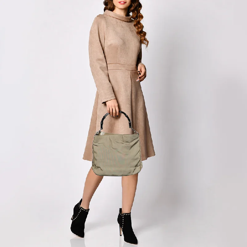 Ladies Gucci shoulder bags with a magnetic - closure flapGucci Khaki Nylon and Leather Bamboo Handle Hobo