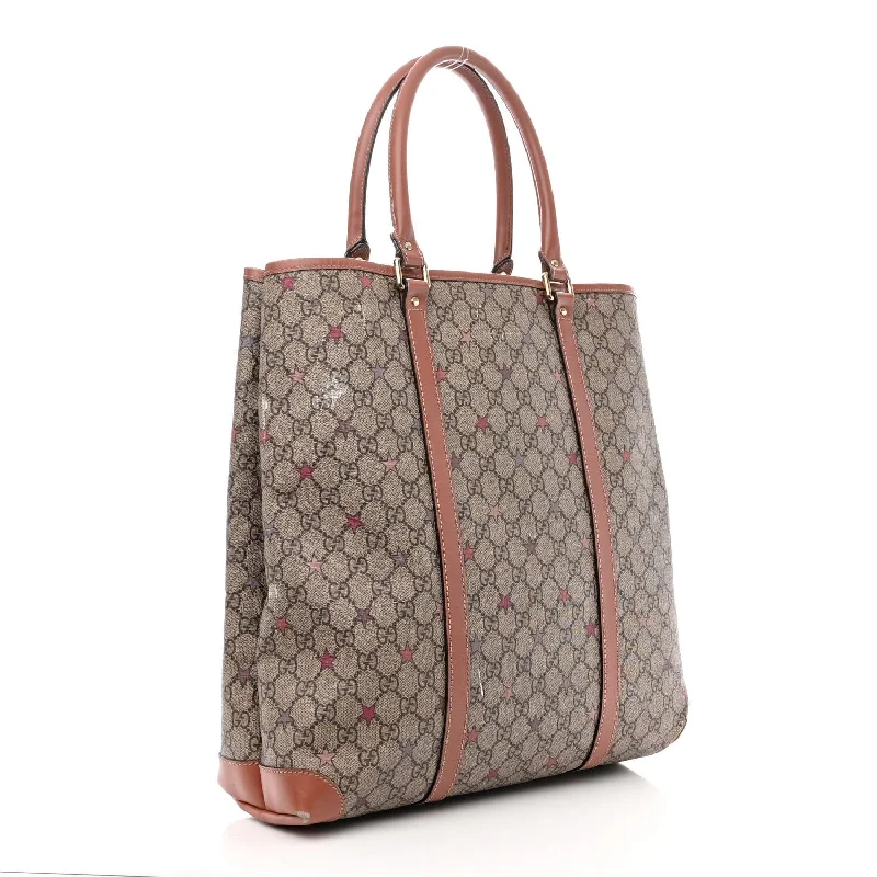 Women Gucci Sylvie bags with a crystal - embellished web stripeGucci Gg Plus Stars Joy Vertical Tote