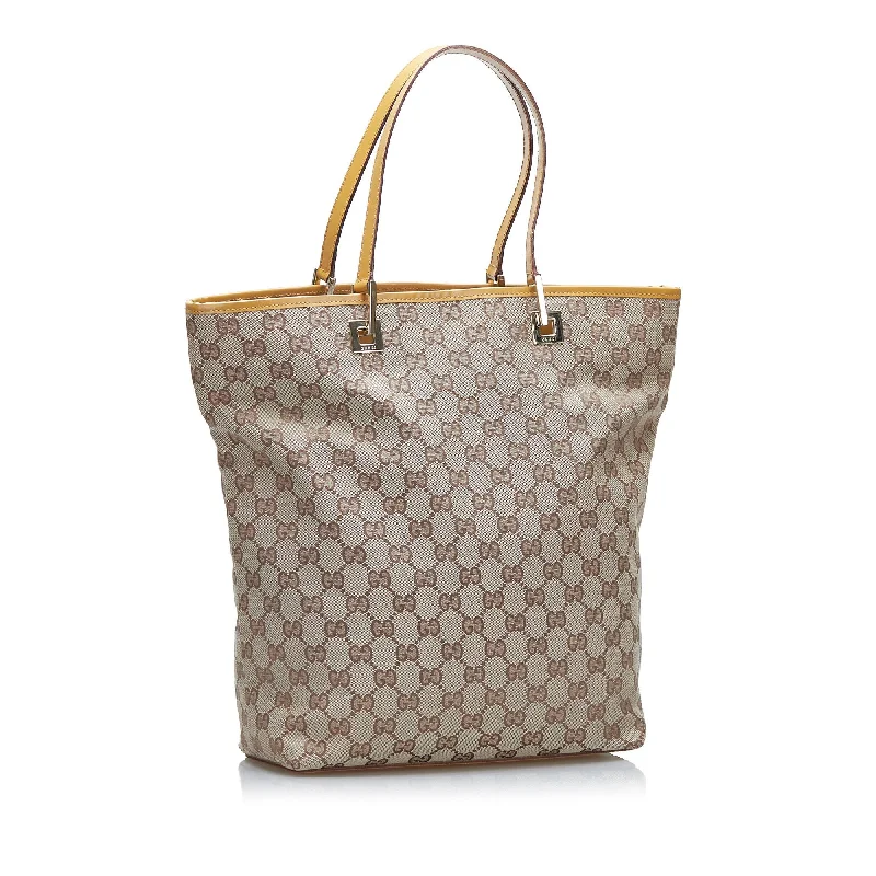 Gucci tote bags for women with a printed Gucci logoGucci GG Canvas Tote (SHG-BRgxUi)