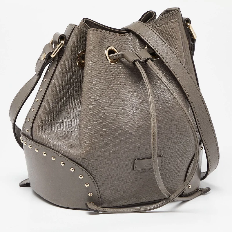 Women Gucci Sylvie bags with a crystal - embellished web stripeGucci Grey Diamante Leather Medium